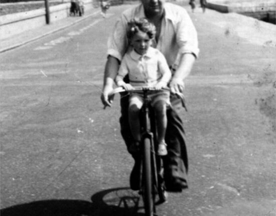 Steve aged about three with his dad at West Bay