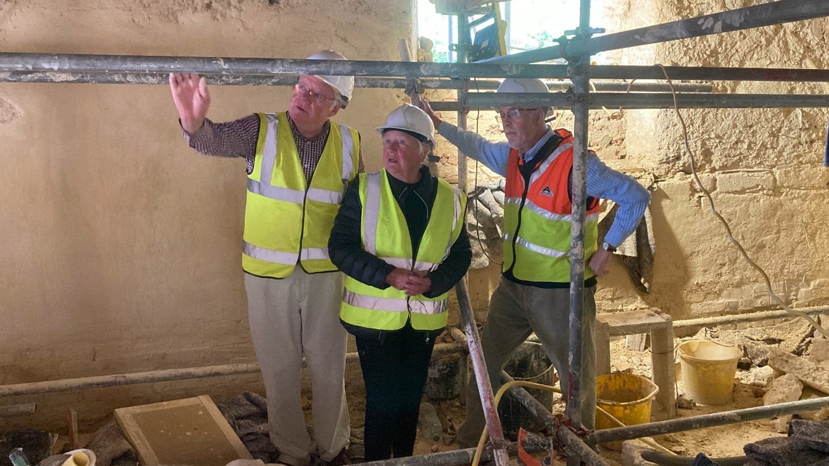 Photo of Andrew showing Chair of Dorset council the interior of Tolpuddler Old Chapel