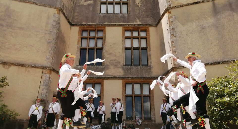 Wessex Morris Men in Sherborne waving a hanky
