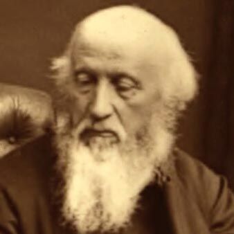 Sepia portrait of William Barnes in formal dark jacket, long white beard, with a dignified, thoughtful expression.