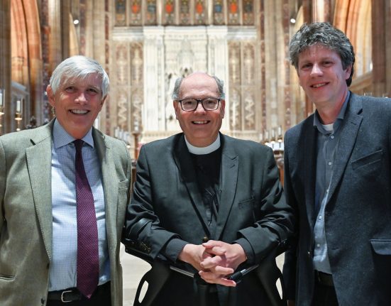Reverend Martin Lee (centre) with colleagues inside Sherborne Abbey, which has launched a £1m fundraising appeal for accessibility improvements