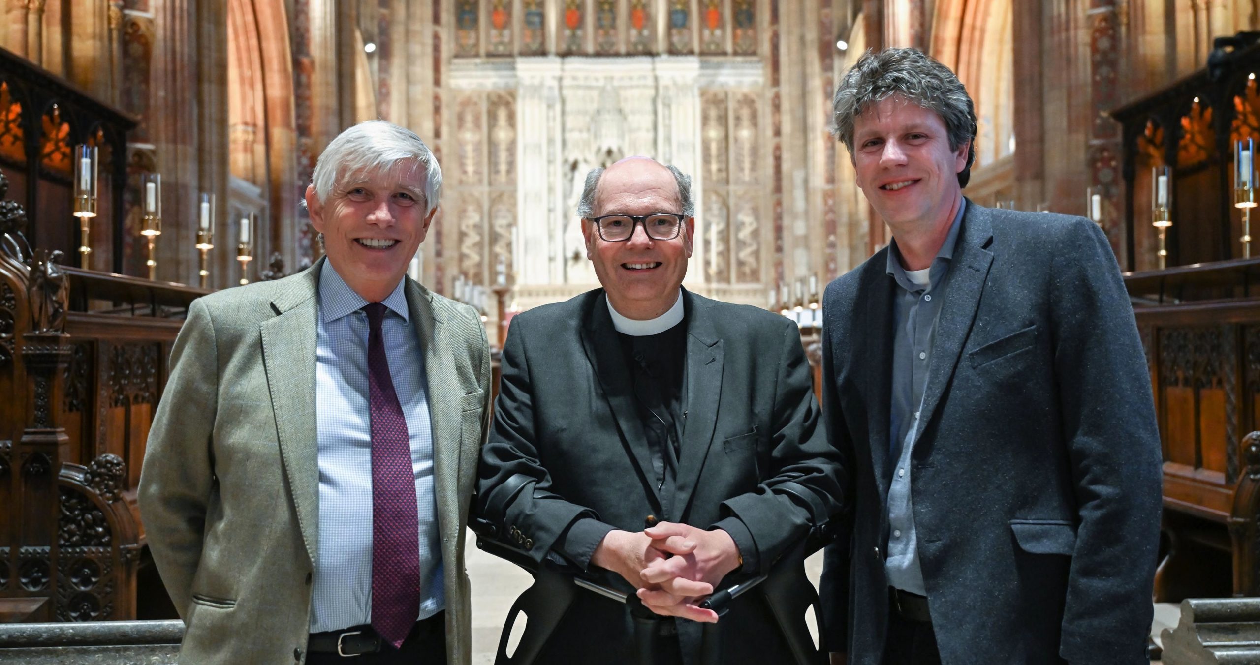 Reverend Martin Lee (centre) with colleagues inside Sherborne Abbey, which has launched a £1m fundraising appeal for accessibility improvements