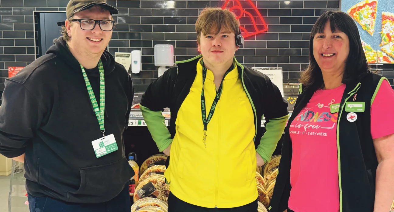 Intern Corey Anstey, centre, with colleagues at Asda Weymouth