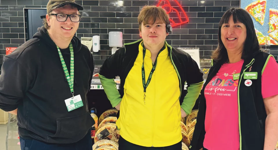 Intern Corey Anstey, centre, with colleagues at Asda Weymouth