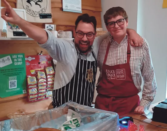 Tobyn Copp, a Dorset Studio School student, works alongside a Brace of Butchers team member in Poundbury