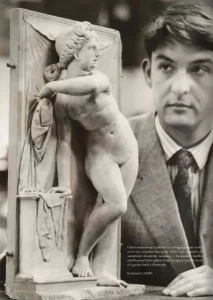 Duke's of Dorchester valuer examining the Renaissance marble relief discovered propping open a shed door in Weymouth, sold for £250,000
