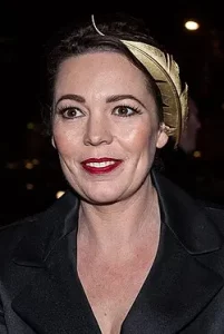 Actress Olivia Colman, who has backed the campaign to save Bridport's Lyric Theatre as well as PJ Harvey, pictured at an evening event wearing a gold leaf headpiece and black coat.