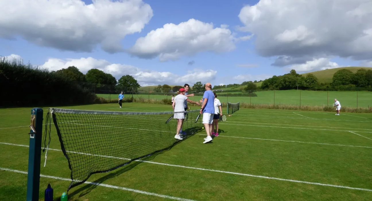 Cattistock Lawn Tennis Club is in a gorgeous setting with top quality grass courts