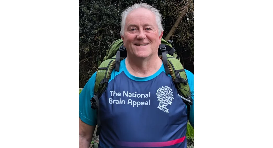 Chris McKenna, 66, from Blandford Forum, wearing a National Brain Appeal running vest and backpack ahead of his 630-mile solo walk for Alzheimer's research.