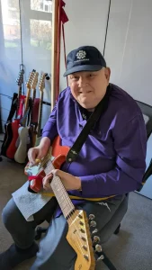 Paul, who has Multiple Sclerosis, plays guitar again thanks to REMAP's disabled adaptations and support aids