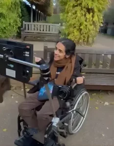 Sapna, a wheelchair user, delighted with REMAP's disabled adaptations that let her take photos independently