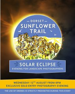 Where to buy solar eclipse glasses in Dorset and the best places to watch: "Poster for a Dorset Sunflower Trail 'Solar Eclipse' evening for landscape photographers, showing the sunflower field logo circle set against a dramatic eclipsed sun with flare and a smoky orange-and-black sky. Event details read: Wednesday 12th August from 6pm, exclusive solo-entry photography evening. A yellow banner states the date and time, and a blue banner warns that drone use is strictly prohibited during the event.