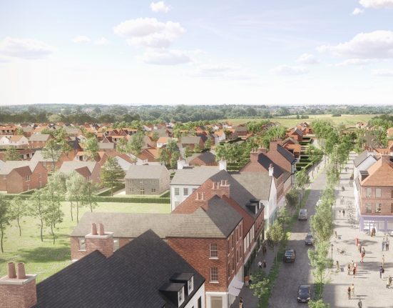 CGI image of the proposed Norchester village centre near Dorchester, Thomas Hardy's home county town, showing traditional-style housing and a high street