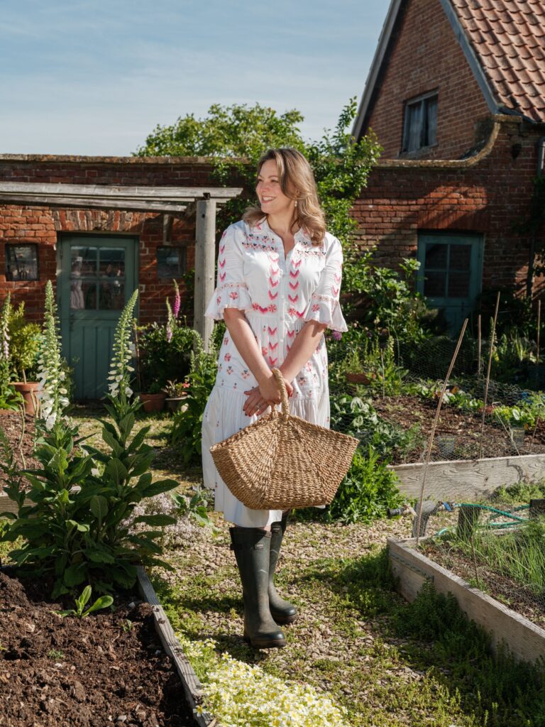 Sophie Long, wife of winemaker Panu Long and managing director of Thornfalcon Winery & Press, in the estate's organic vegetable garden