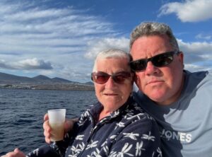 Vivienne Clarke of the Horse With the Red Umbrella in Dorchester, working past retirement age, with son Damon Clarke of Damo’s Taxis on a boat trip.