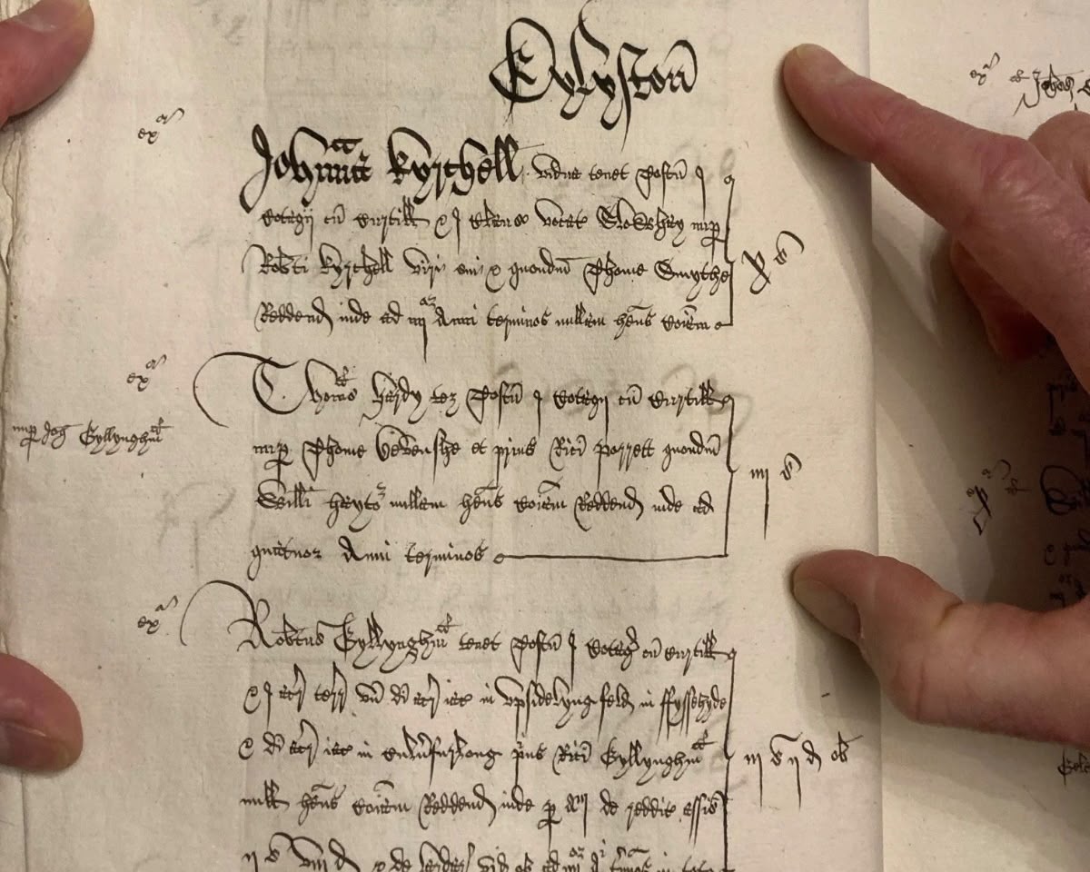 Milton Abbas manorial court record of 1527, held in Winchester College, mentioning Johanna Kyrchell. Handwritten Latin record from 1527 with the heading Elyston and an entry for Johanna Kyrchell, a finger pointing to the page